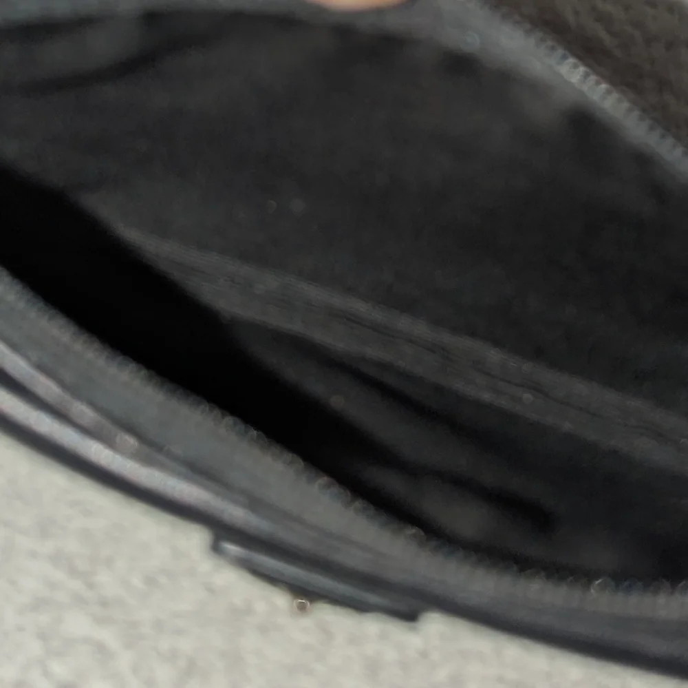 Coach Black and Silver Leather Wristlet Clutch